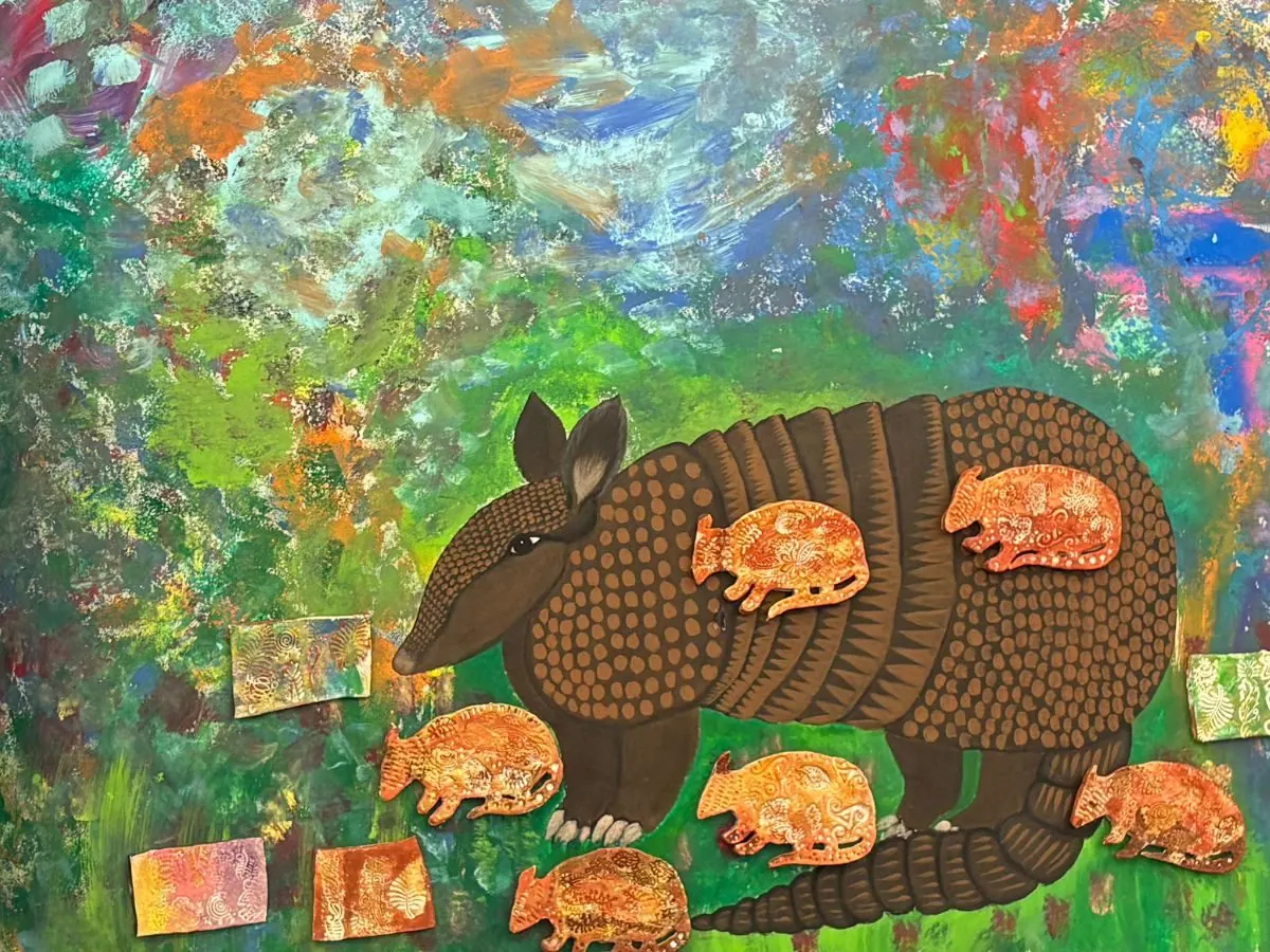 A painting of a large armadillo with a cluster of smaller armadillos gathered on and around it, against a mottled green and blue field.