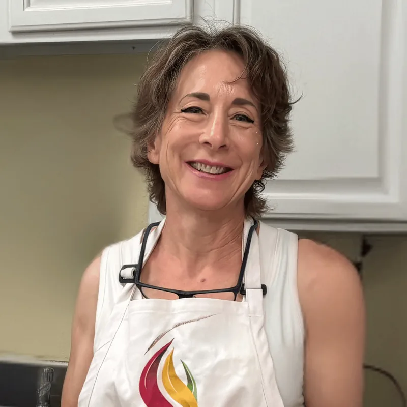 Clare Wuellner, PhD, Senior Artist and educator at Artly World, posing for her professional team headshot.